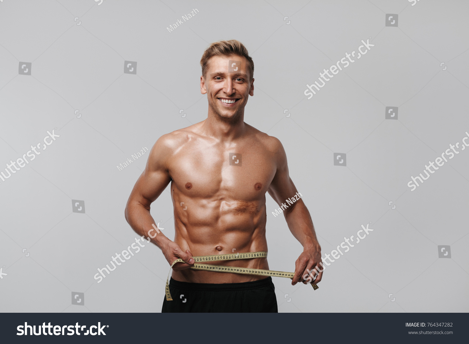 Handsome Sportsman Posing Shirtless Studio Measuring Stock Photo (Edit ...