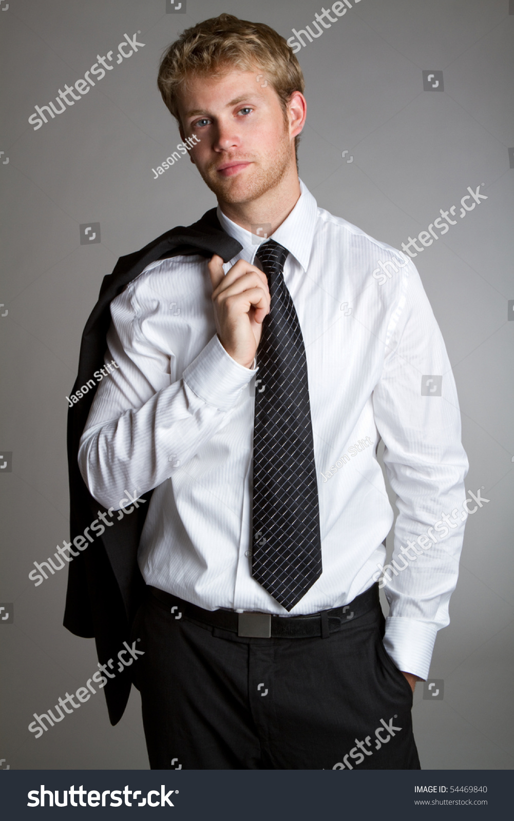 Handsome Young Businessman Wearing Suit Stock Photo (Edit Now) 54469840