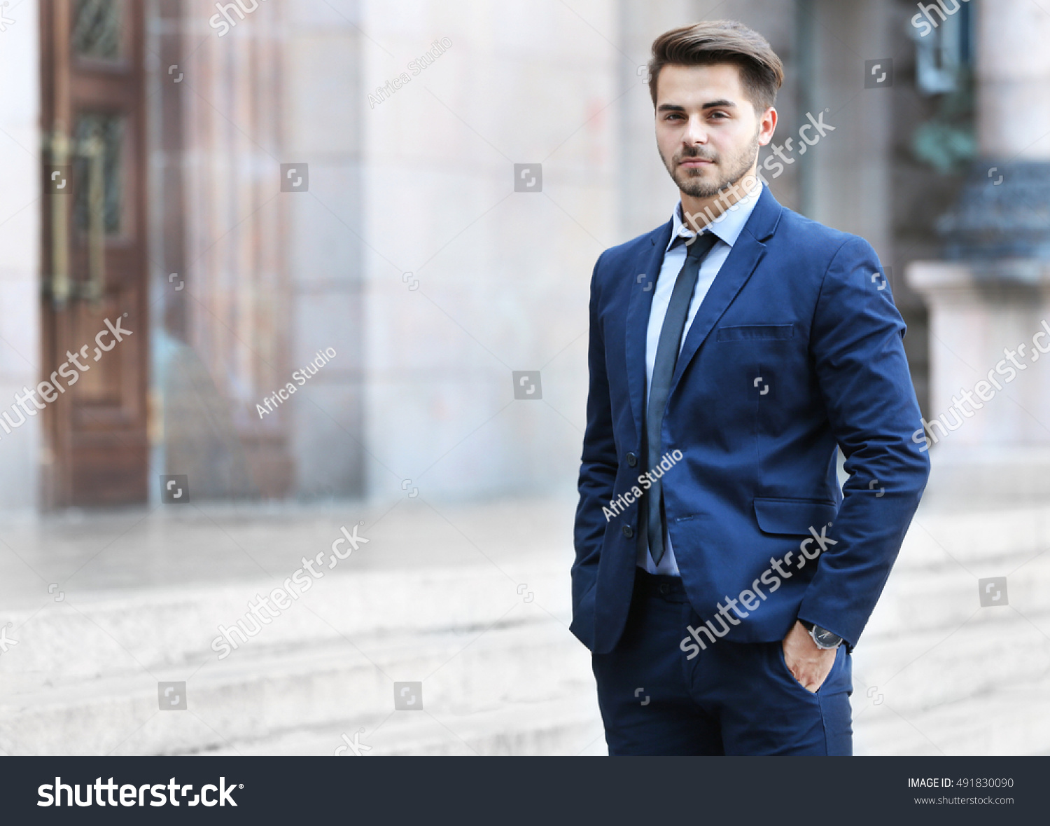 Handsome Young Lawyer At Office Building Stock Photo 491830090 ...