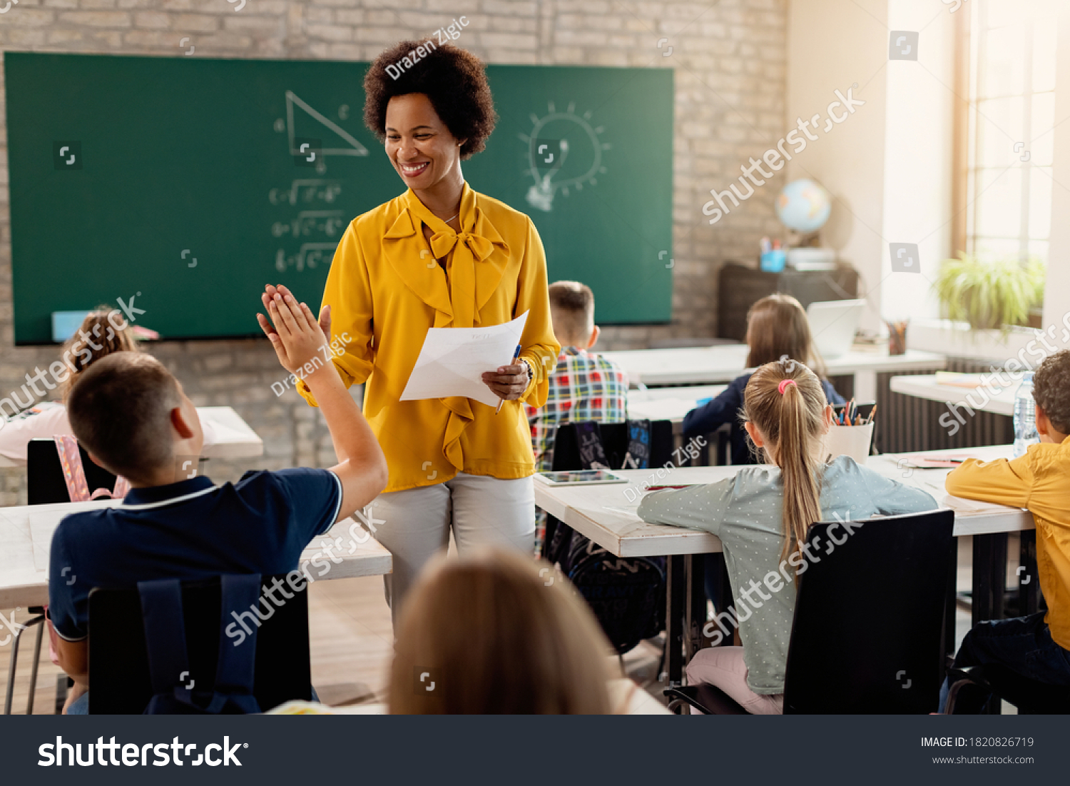 Happy African American Teacher Giving Highfive Stock Photo 1820826719 ...