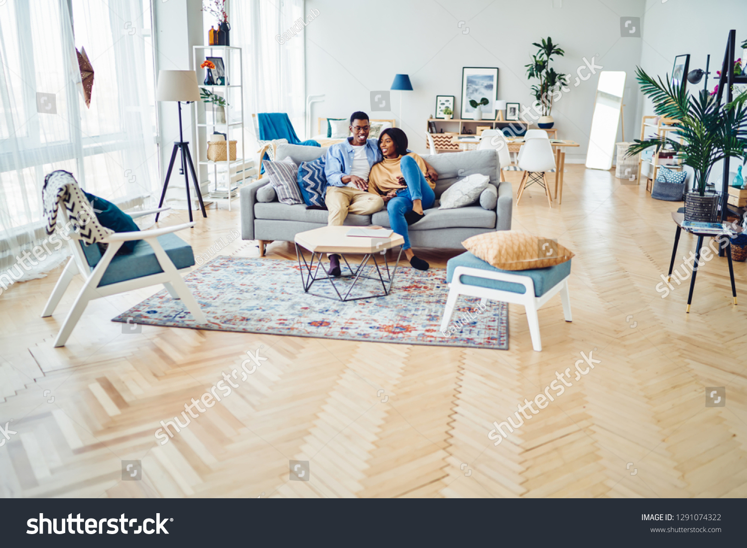 Happy African American Young Family Sitting Stock Photo Edit Now 1291074322