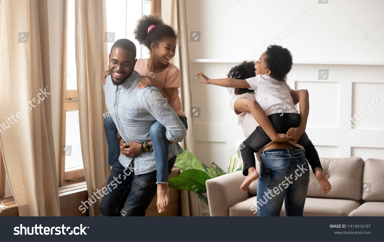 Happy African Family Mom Dad Piggyback Stock Photo Edit Now