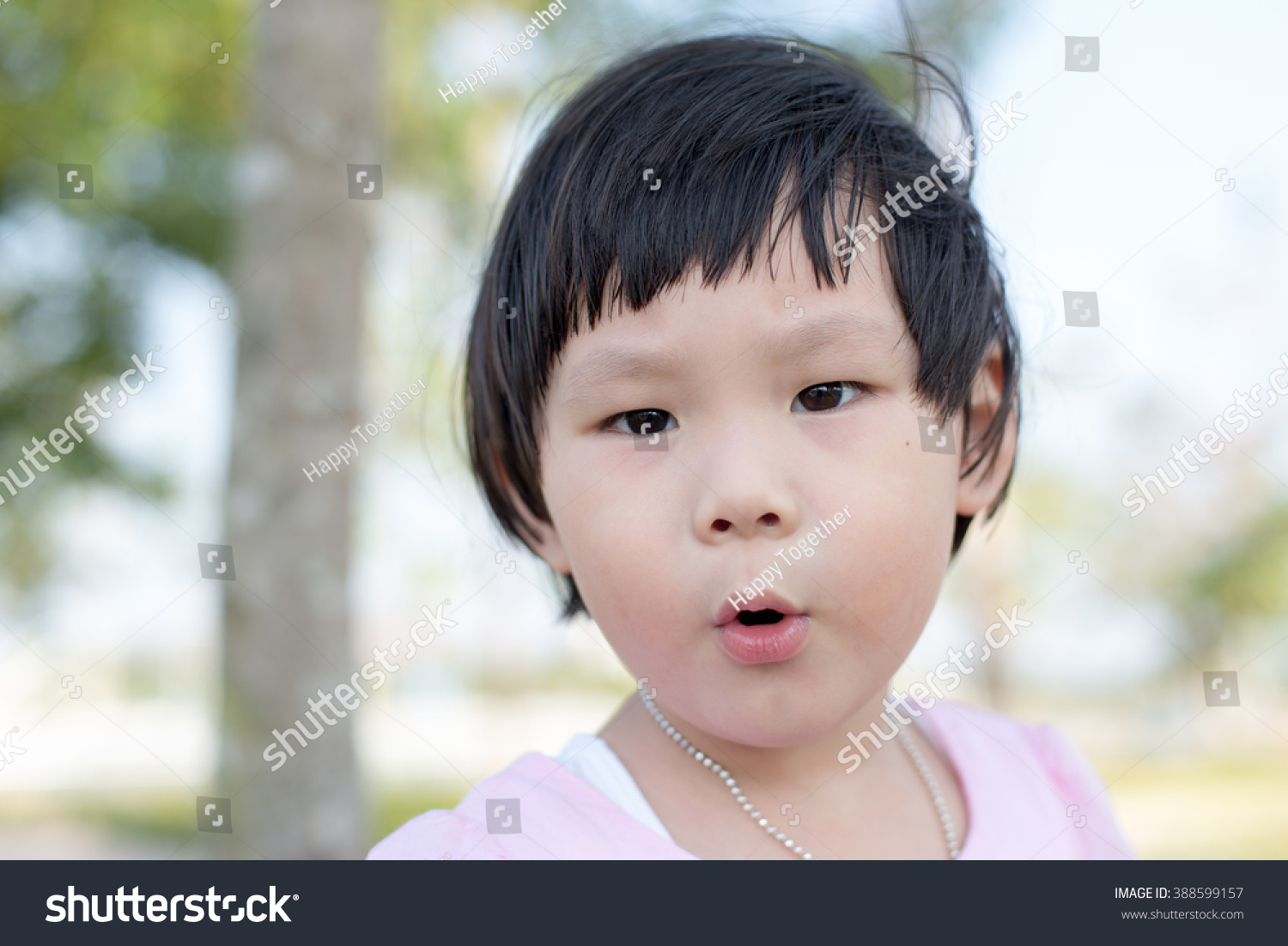 Happy Asian Girl Outdoor Stock Photo (Edit Now) 388599157