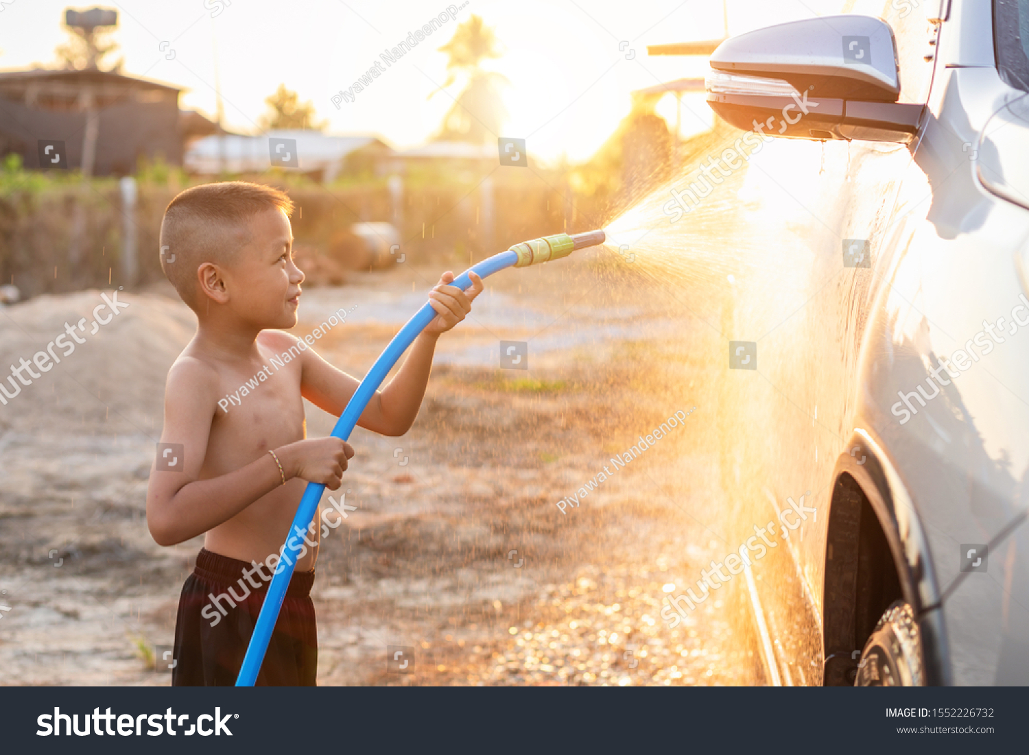 Happy Asian Little Boy Playing Water Stock Photo Edit Now 1552226732