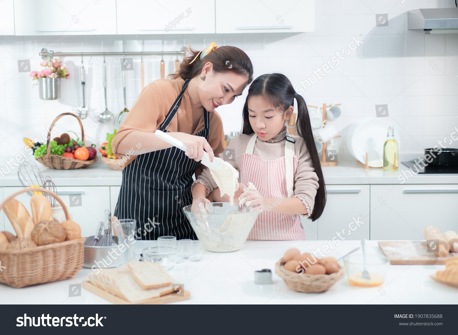 Happy Asian Mother Caring Teaching Adorable Stock Photo 1907835688 ...