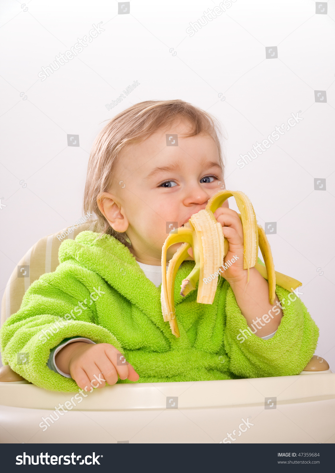 baby eating banana