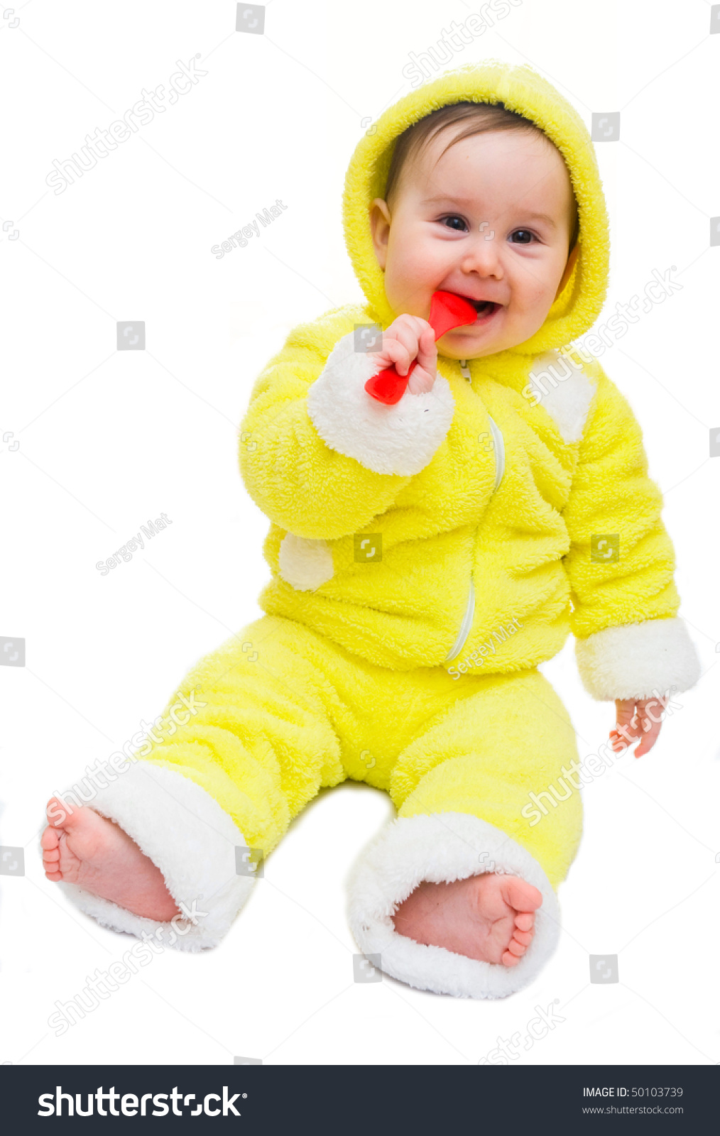 baby girl in yellow dress