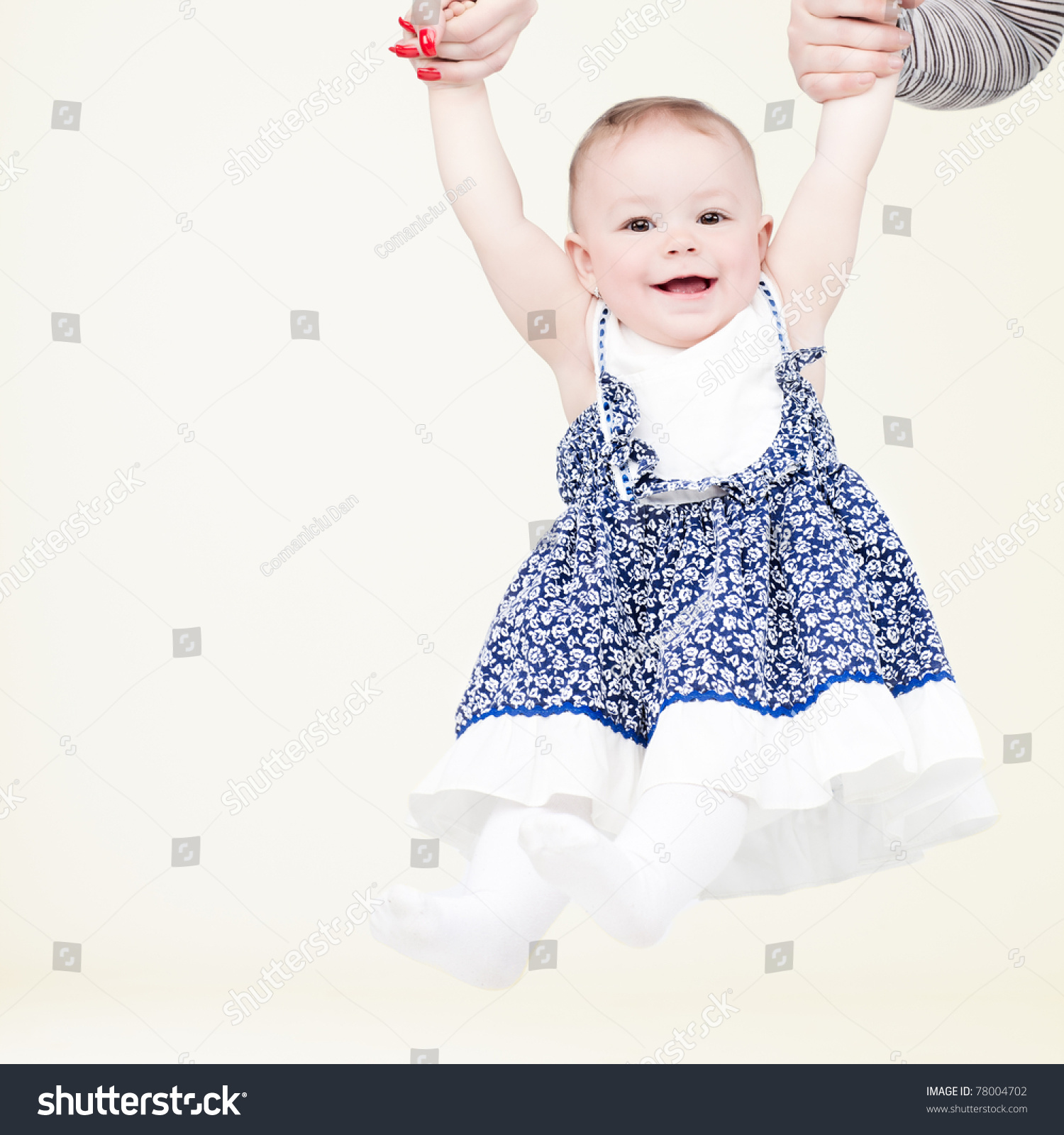 Laughing baby swinging