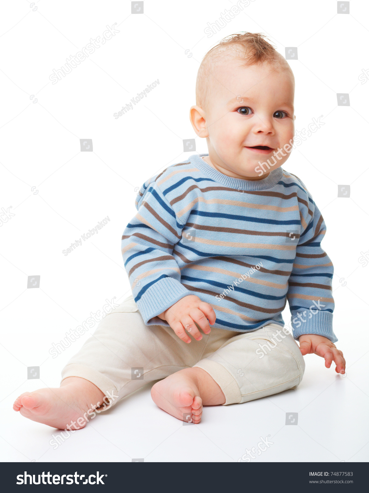 Happy Child Is Sitting On Floor, Isolated Over White Stock Photo ...