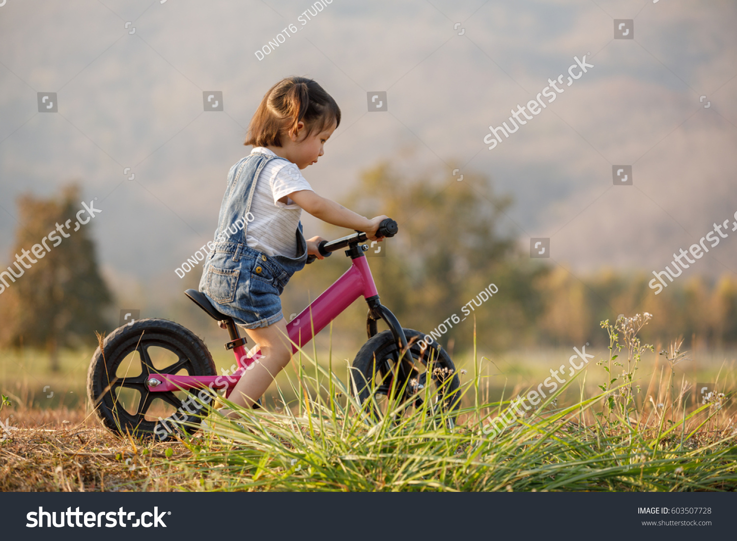 little girl riding bike