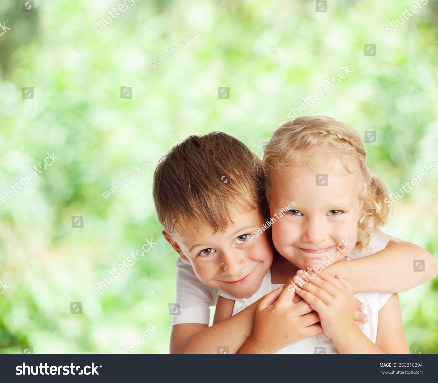 Happy Children Outdoors. Boy And Girl In Summer Stock Photo 253810294 ...