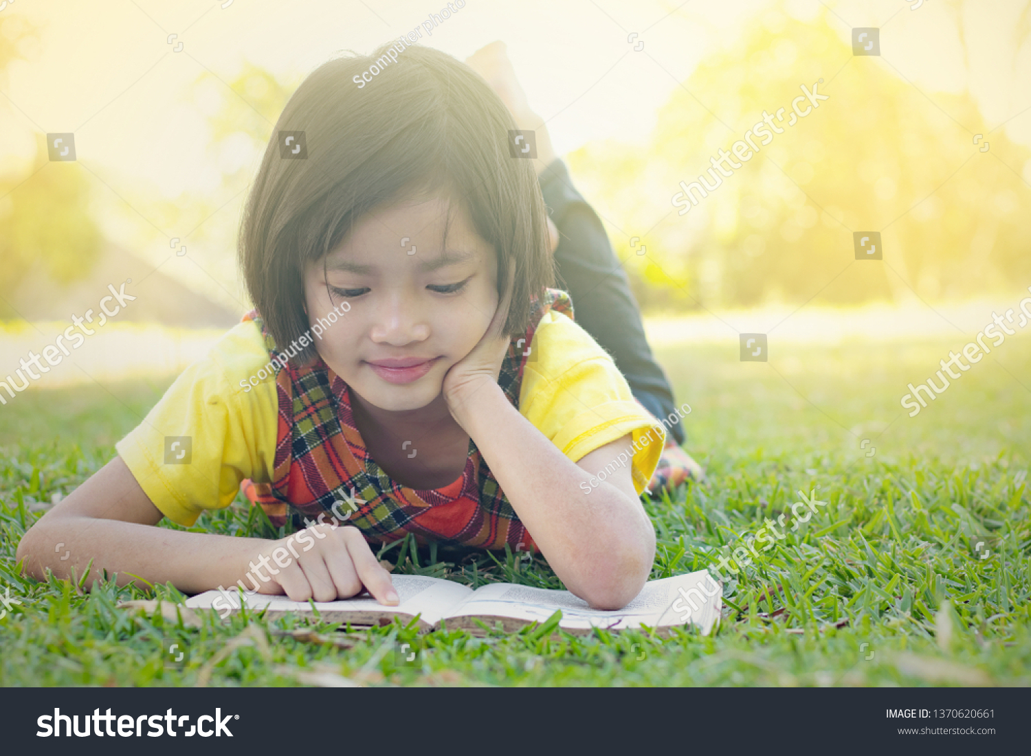 Happy Children Reading Books On Green Stock Photo 1370620661 | Shutterstock