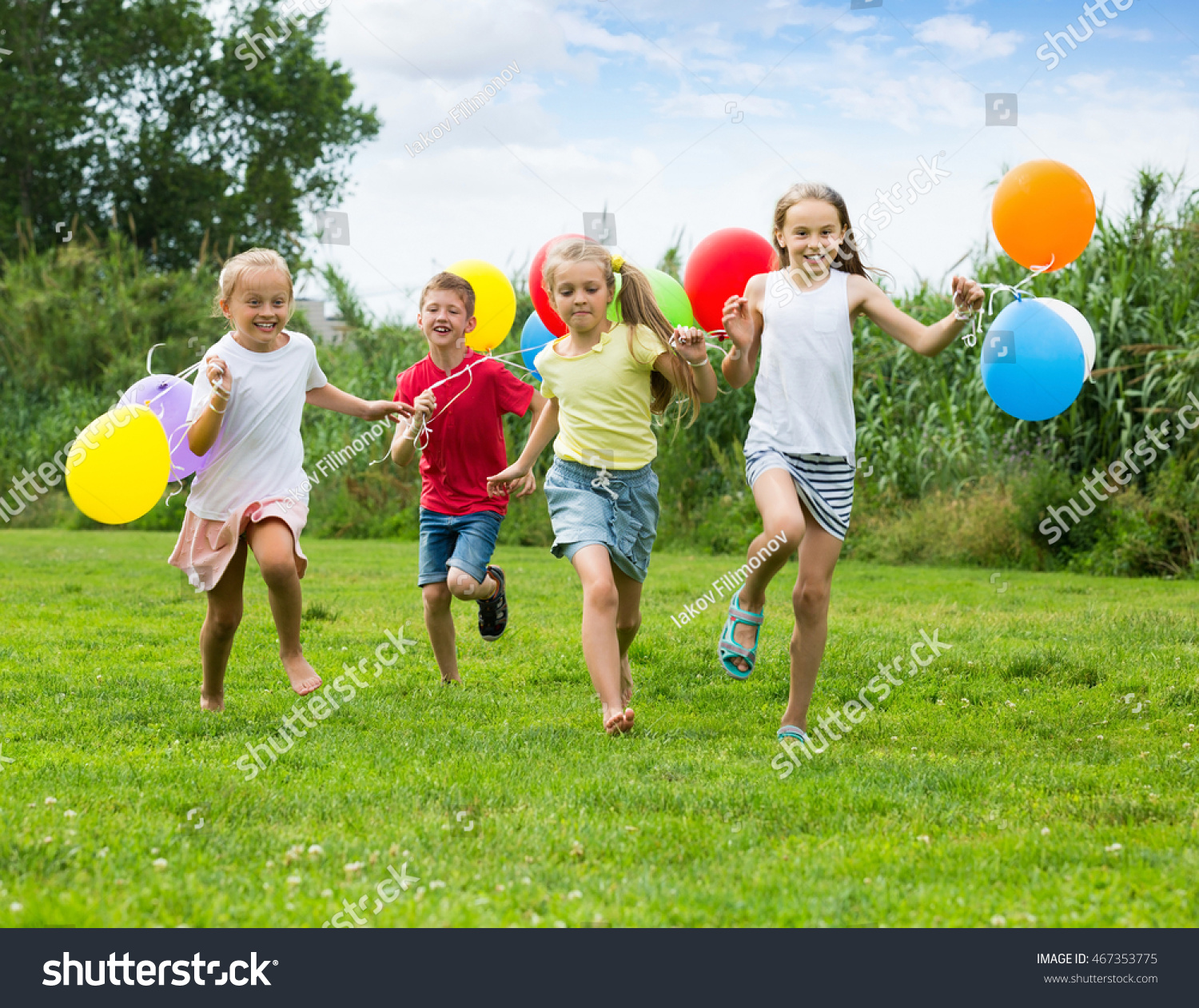 Happy Children Running Balloons Hands On Stock Photo (Edit Now) 467353775