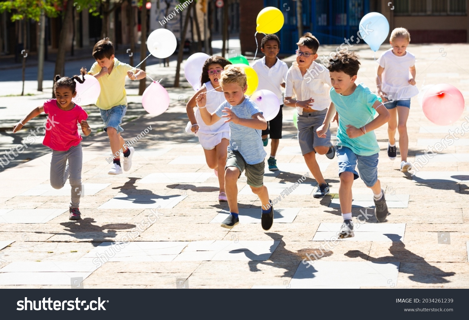 Happy Children Balloons Running Race Laughing Stock Photo 2034261239 ...