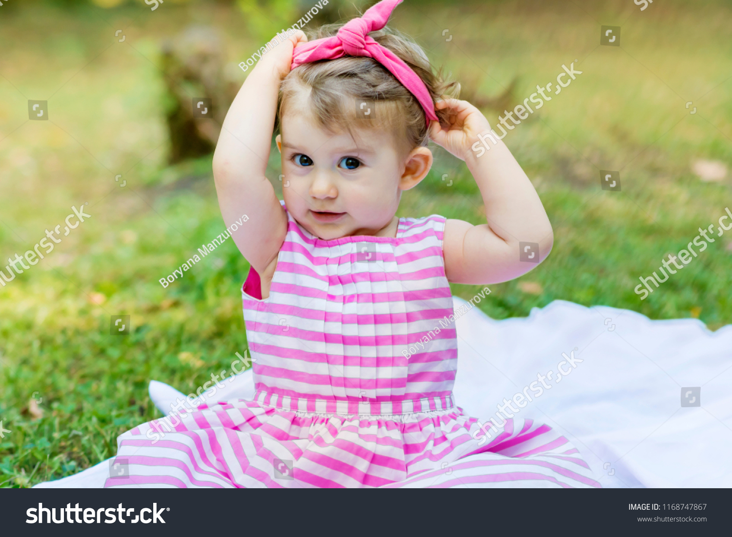 cute baby girl in pink dress