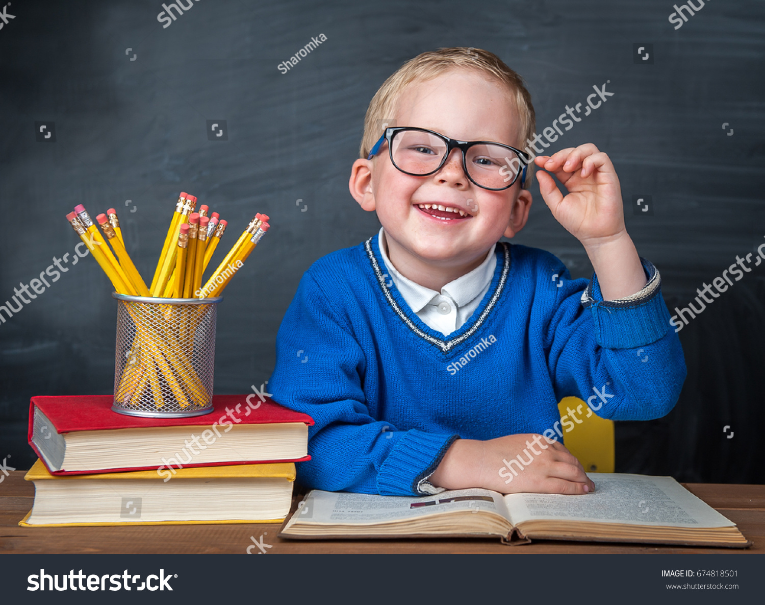 Happy Cute Clever Boy Sitting Desk Stock Photo Edit Now 674818501