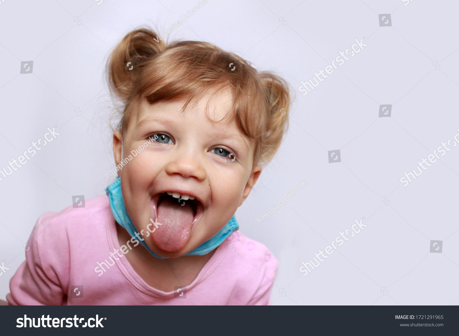 Happy Emotional Little Girl Shows Tongue Stock Photo (Edit Now) 1721291965