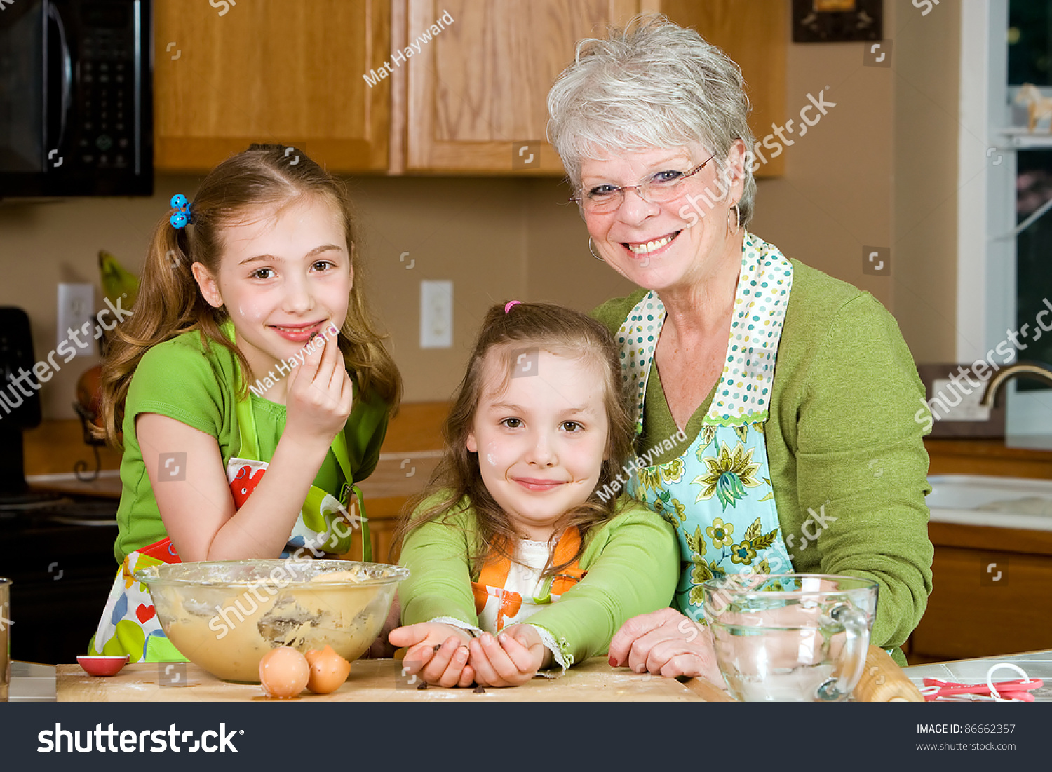 Happy Family Featuring A Friendly Grandma Baking Cookies In A Home ...