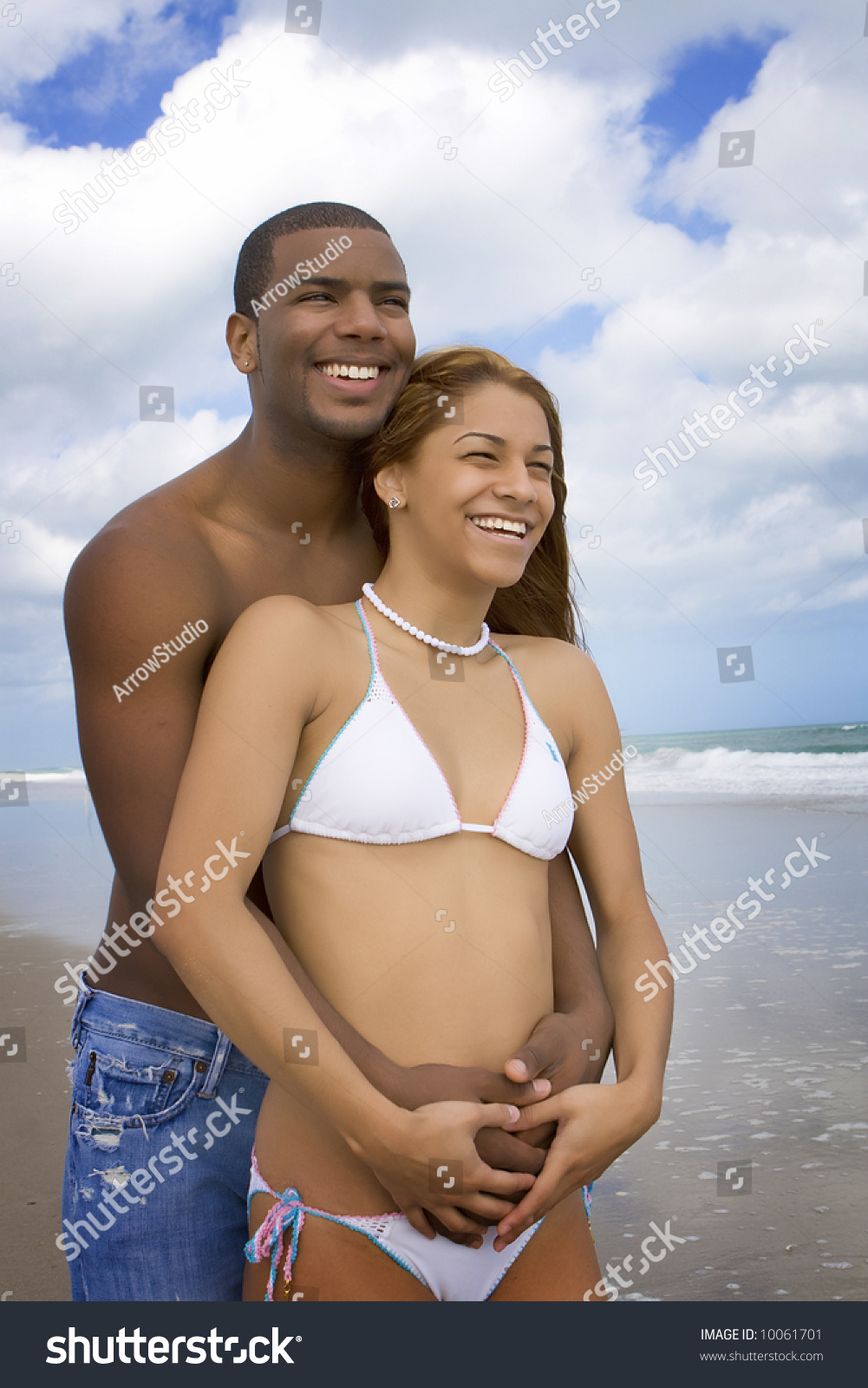 Happy Interracial Couple On Beach Stock Photo 10061701 -1728