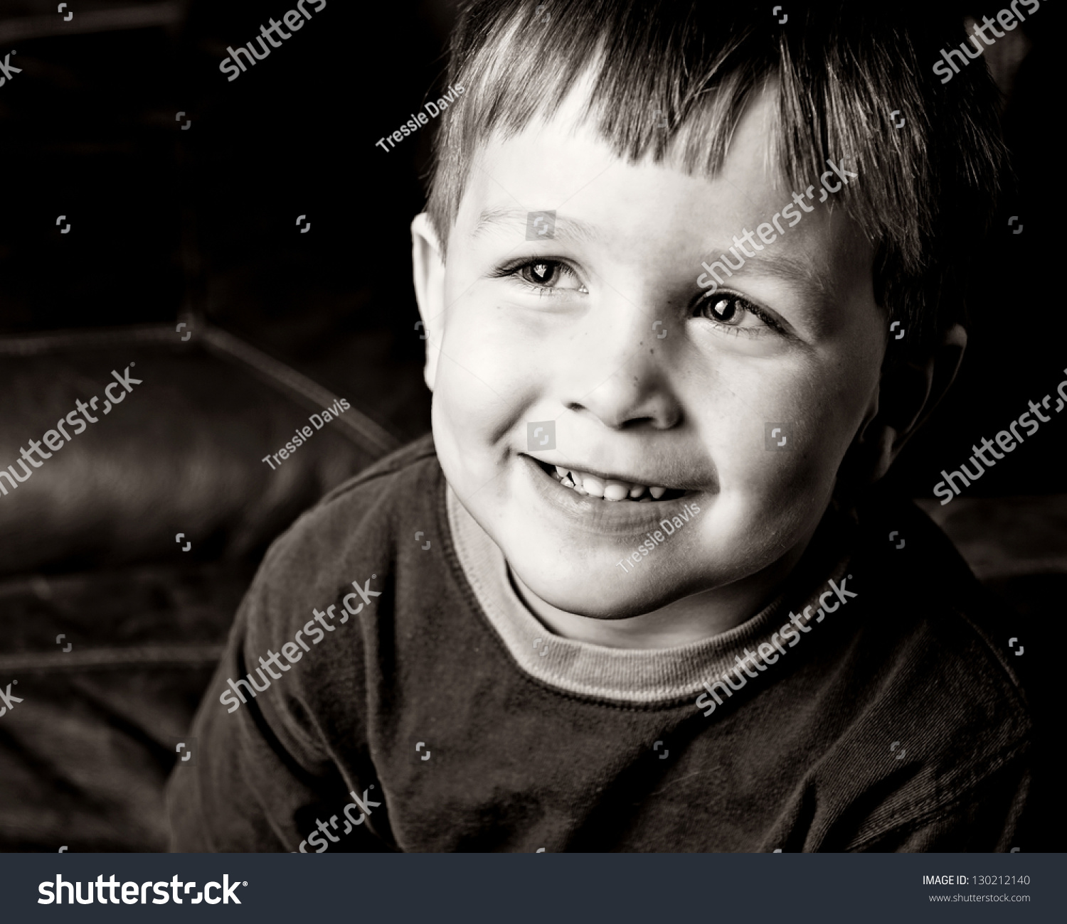 Happy Little Boy Looking Off To The Side. Black And White Stock Photo ...