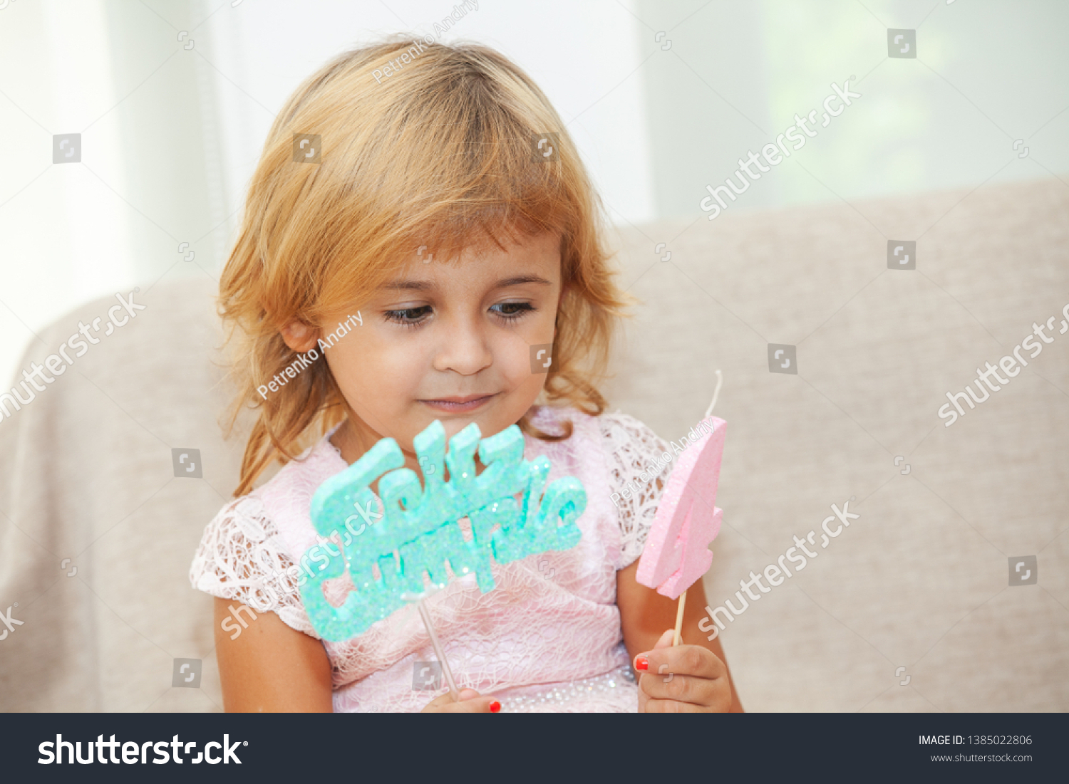 happy-little-girl-on-her-birthday-stock-photo-edit-now-1385022806