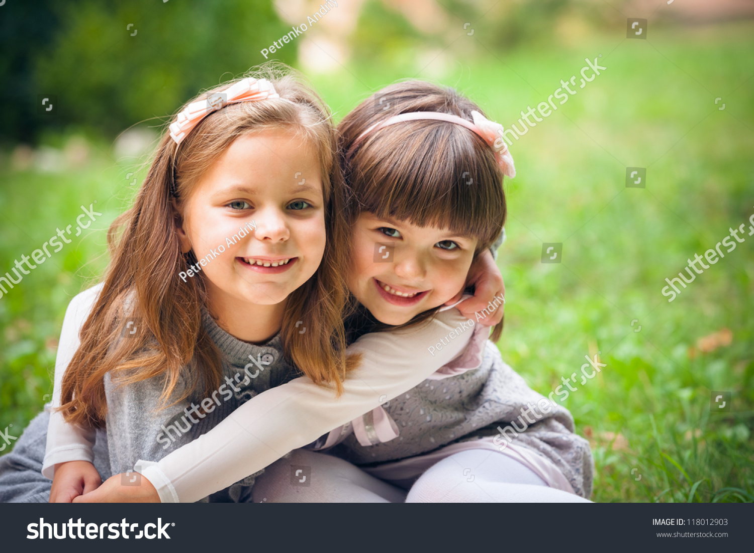 Happy Little Girlfriends In Park Stock Photo 118012903 : Shutterstock