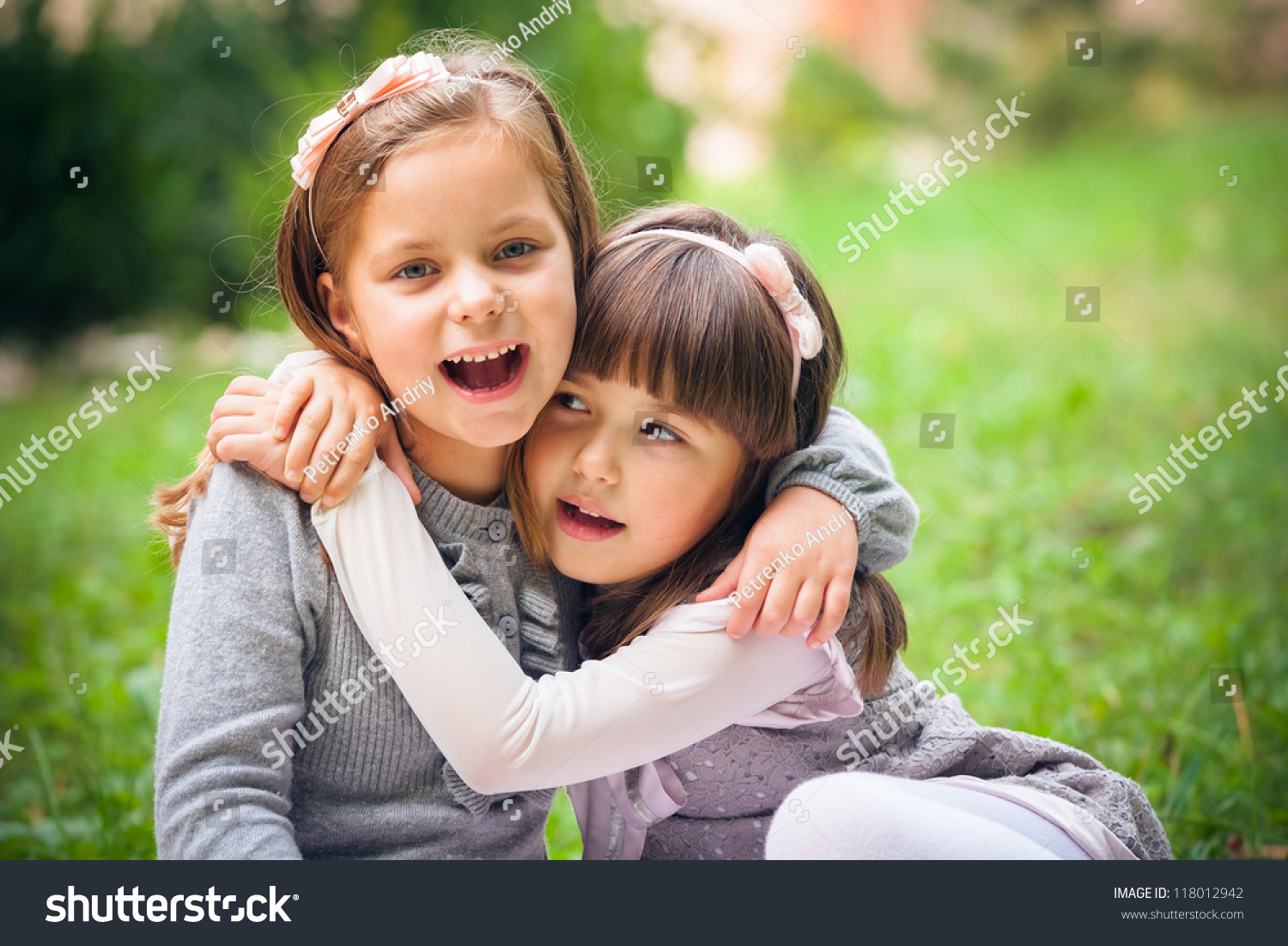 Happy Little Girlfriends In Park Stock Photo 118012942 : Shutterstock