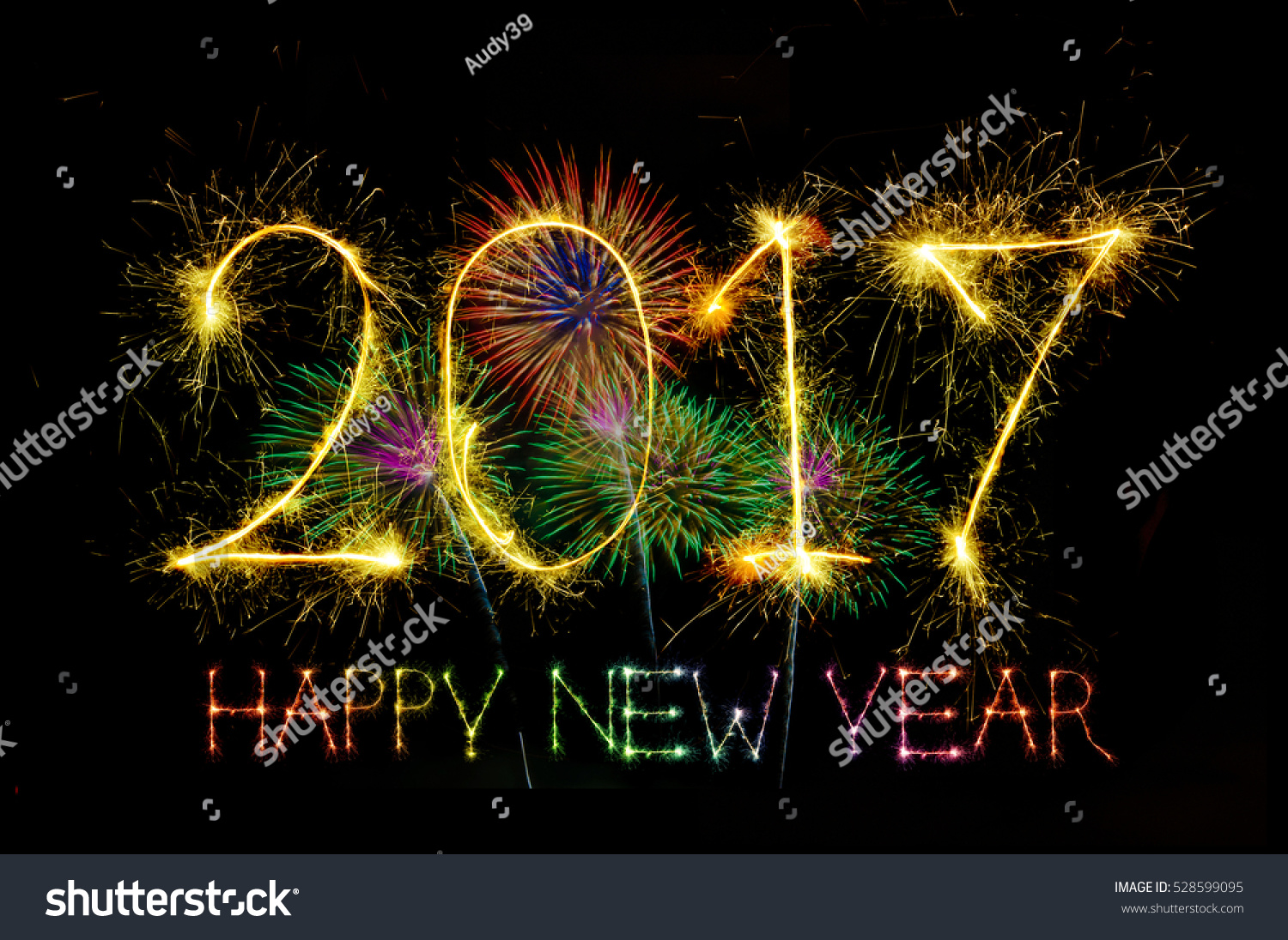 Happy New Year 2017 From Colorful Sparkle On Black Background Fireworks Light Up The Sky,New