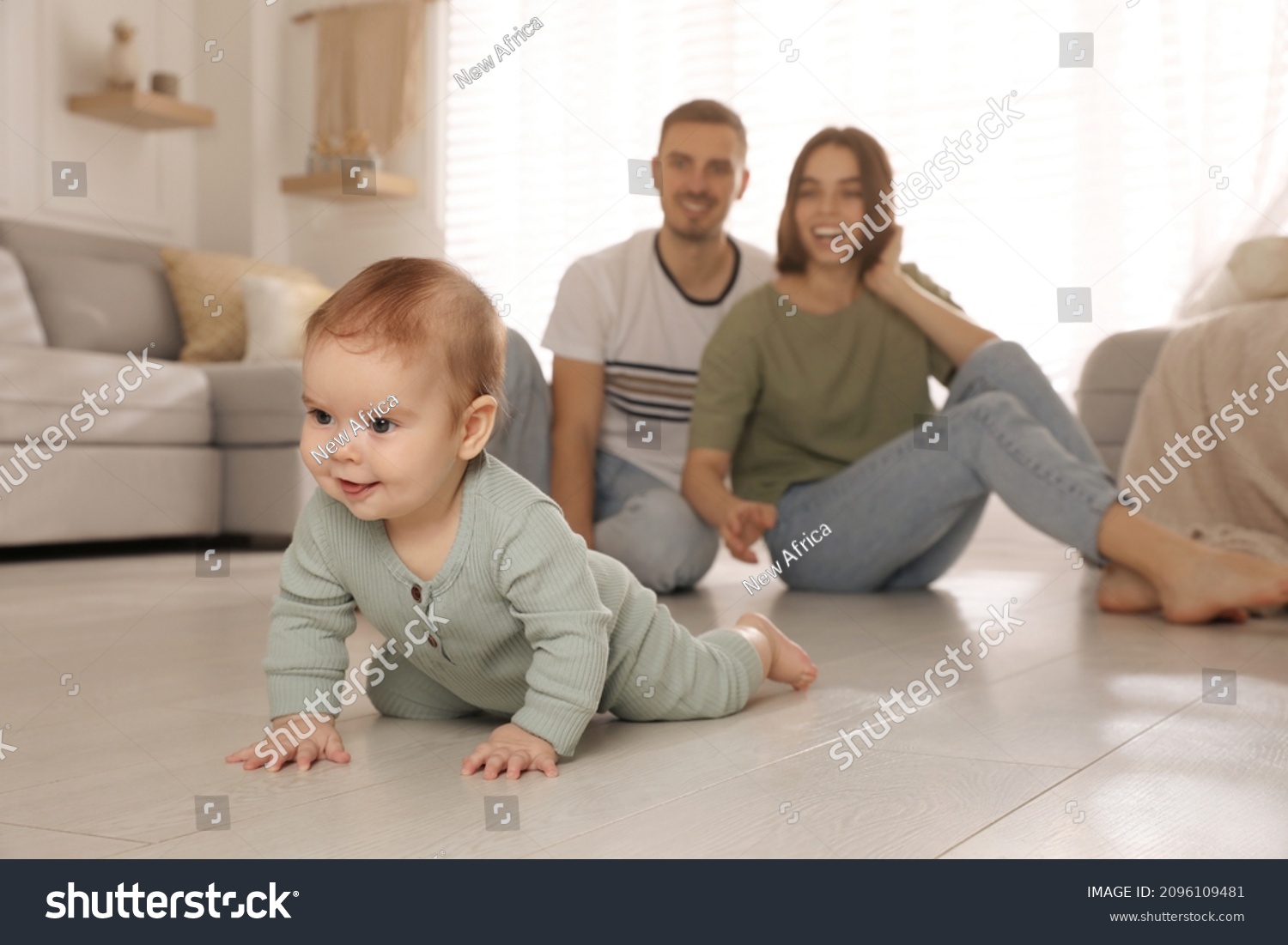 Happy Parents Watching Their Cute Baby Stock Photo 2096109481 ...