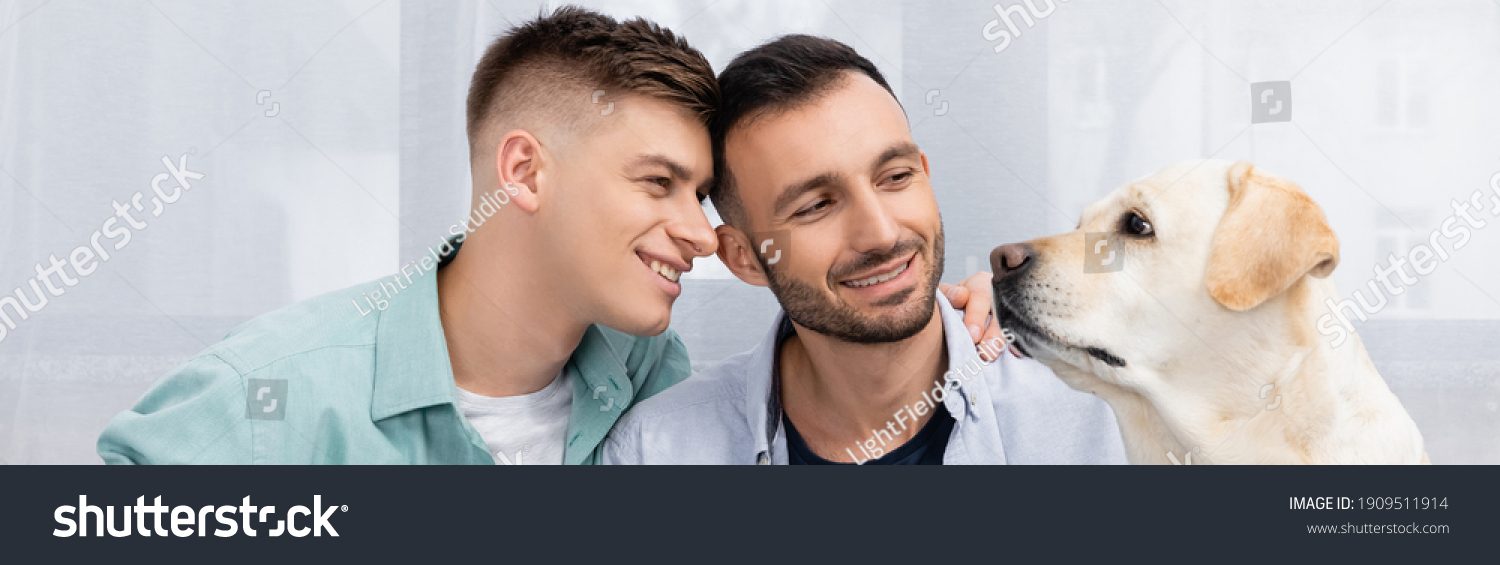 happy-same-sex-couple-smiling-looking-1909511914-shutterstock