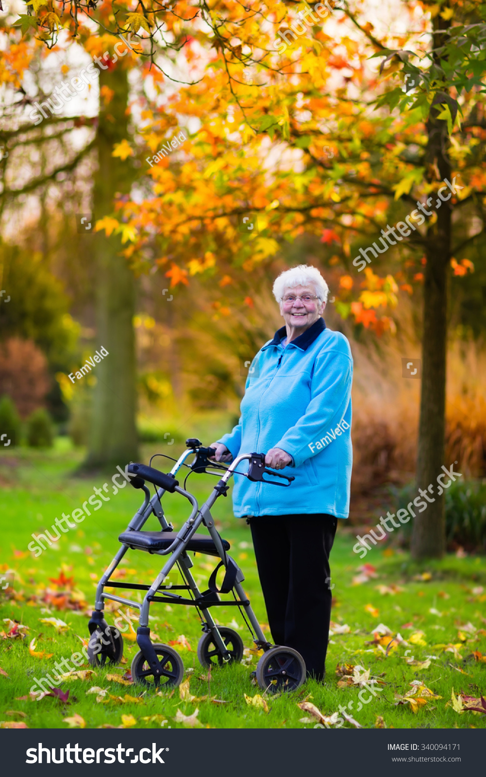 Happy Senior Handicapped Lady With A Walking Disability Enjoying A Walk ...