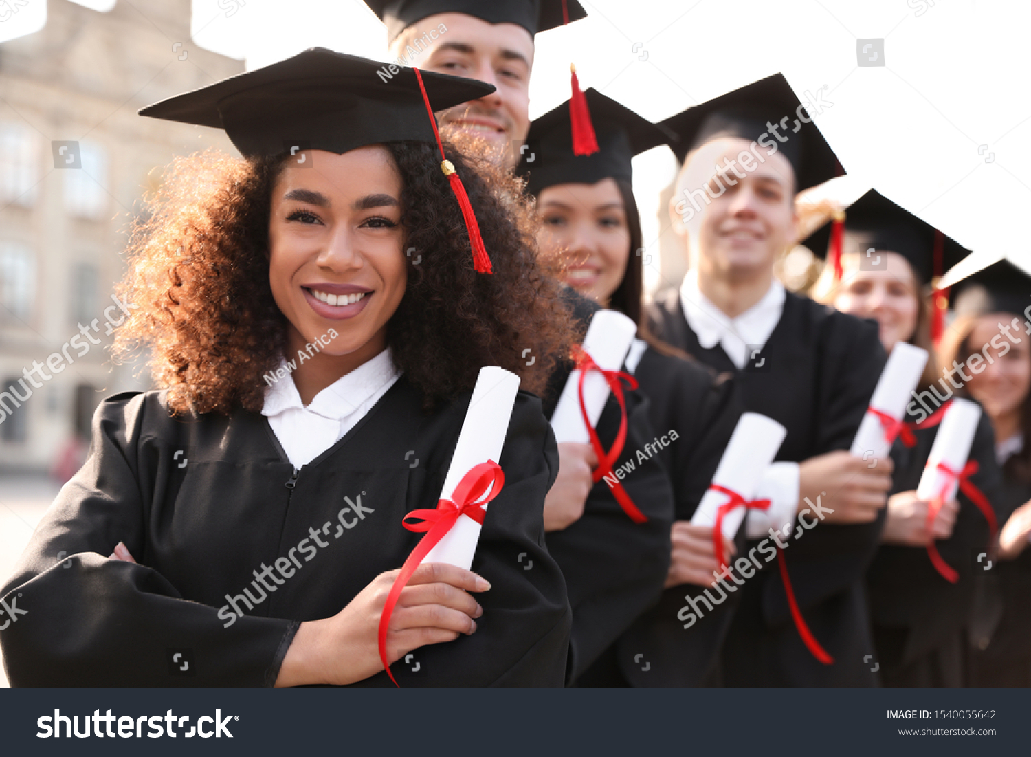 Happy Students Diplomas Outdoors Graduation Ceremony Stockfoto