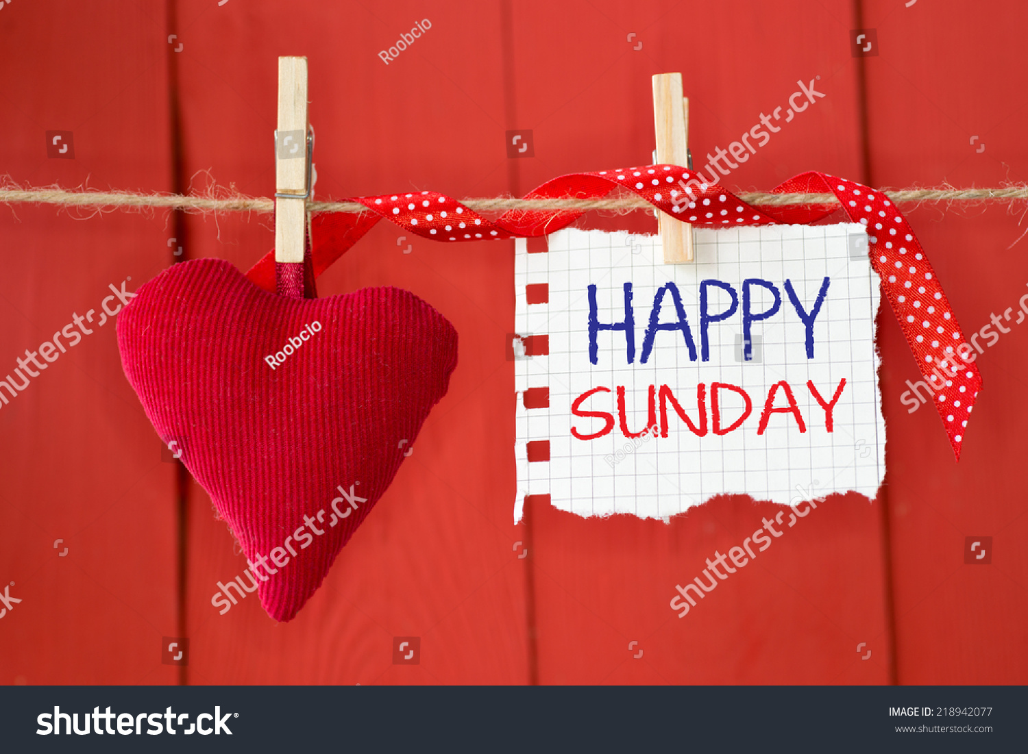 Happy Sunday On Instant Paper And Small Red Hearts Hanging On The ...