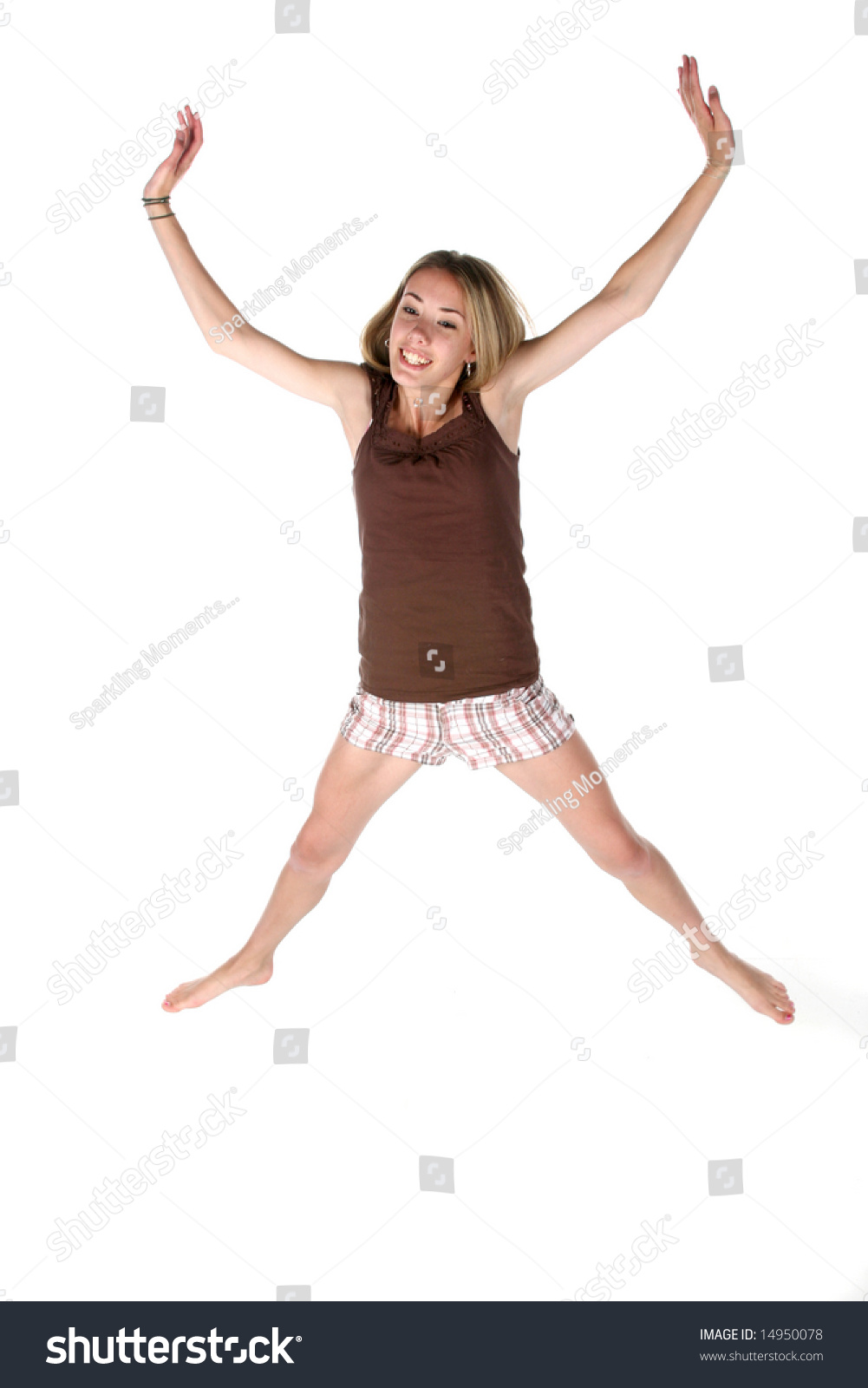 Happy Teenage Girl Jumping In The Air Stock Photo 14950078 : Shutterstock