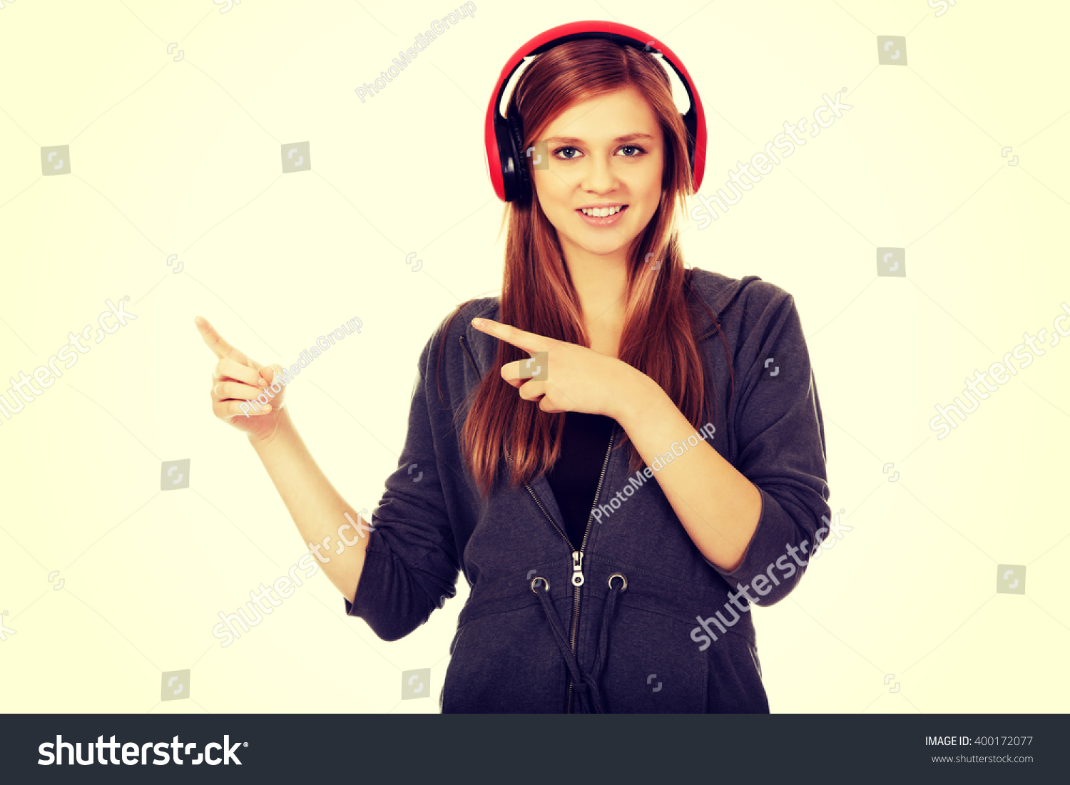 Happy Teenage Woman Pointing Something Stock Photo 400172077 | Shutterstock