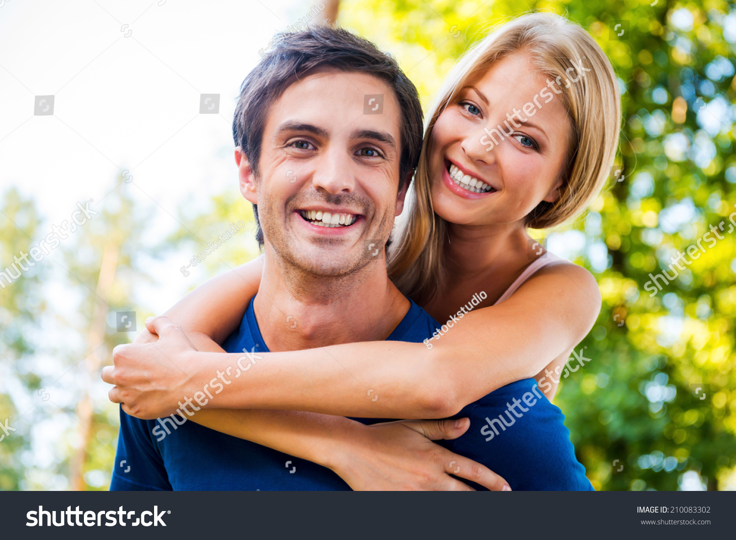 Happy To Be Together. Low Angle View Of Beautiful Young Loving Couple ...