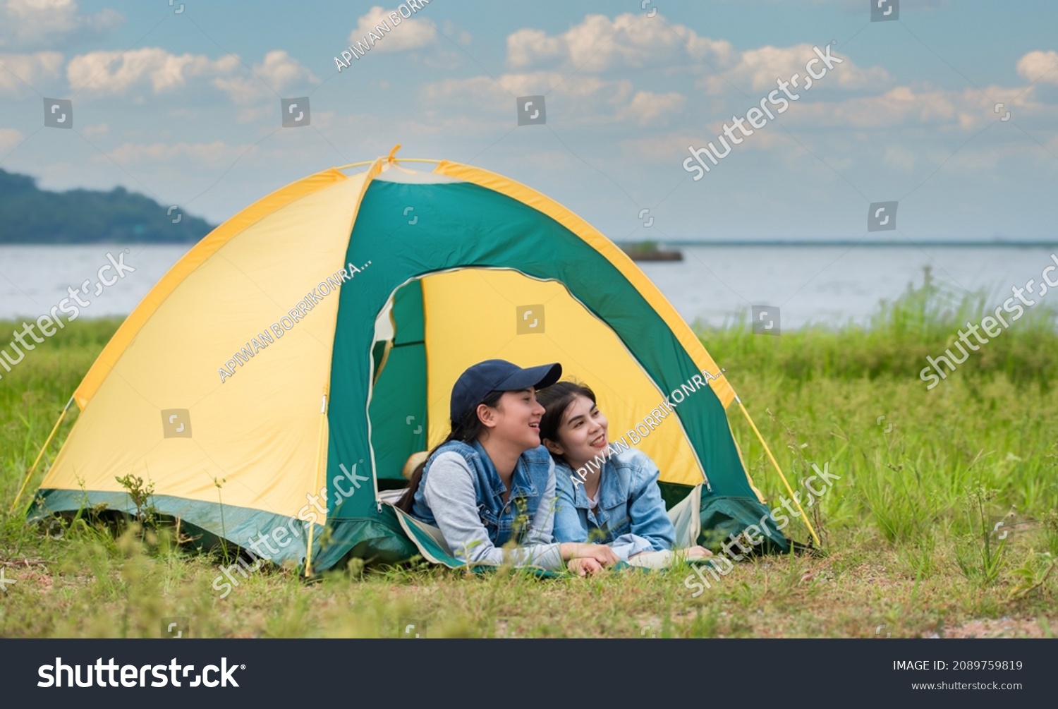 happy-two-asian-woman-lying-down-stock-photo-edit-now-2089759819