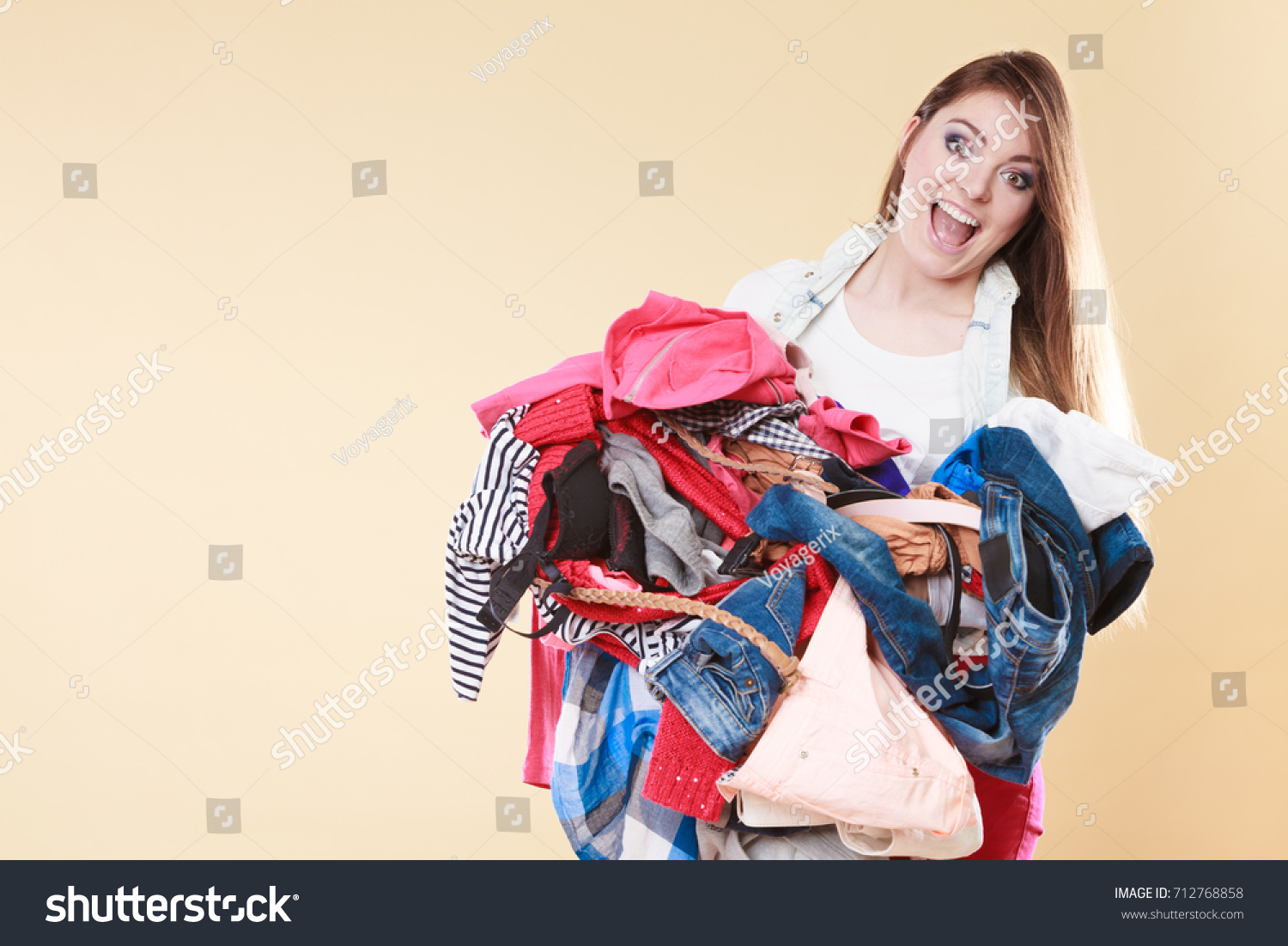 Carrying pile clothes Images, Stock Photos & Vectors | Shutterstock