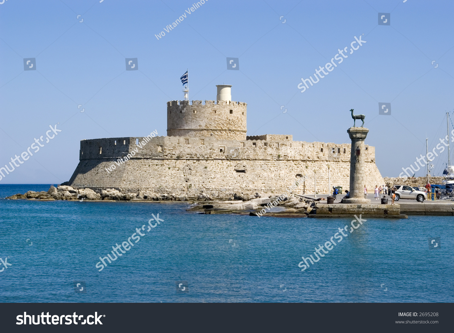 Harbour Gates And Lighthouse St. Nicholas At Rhodes, Greece. There Are ...