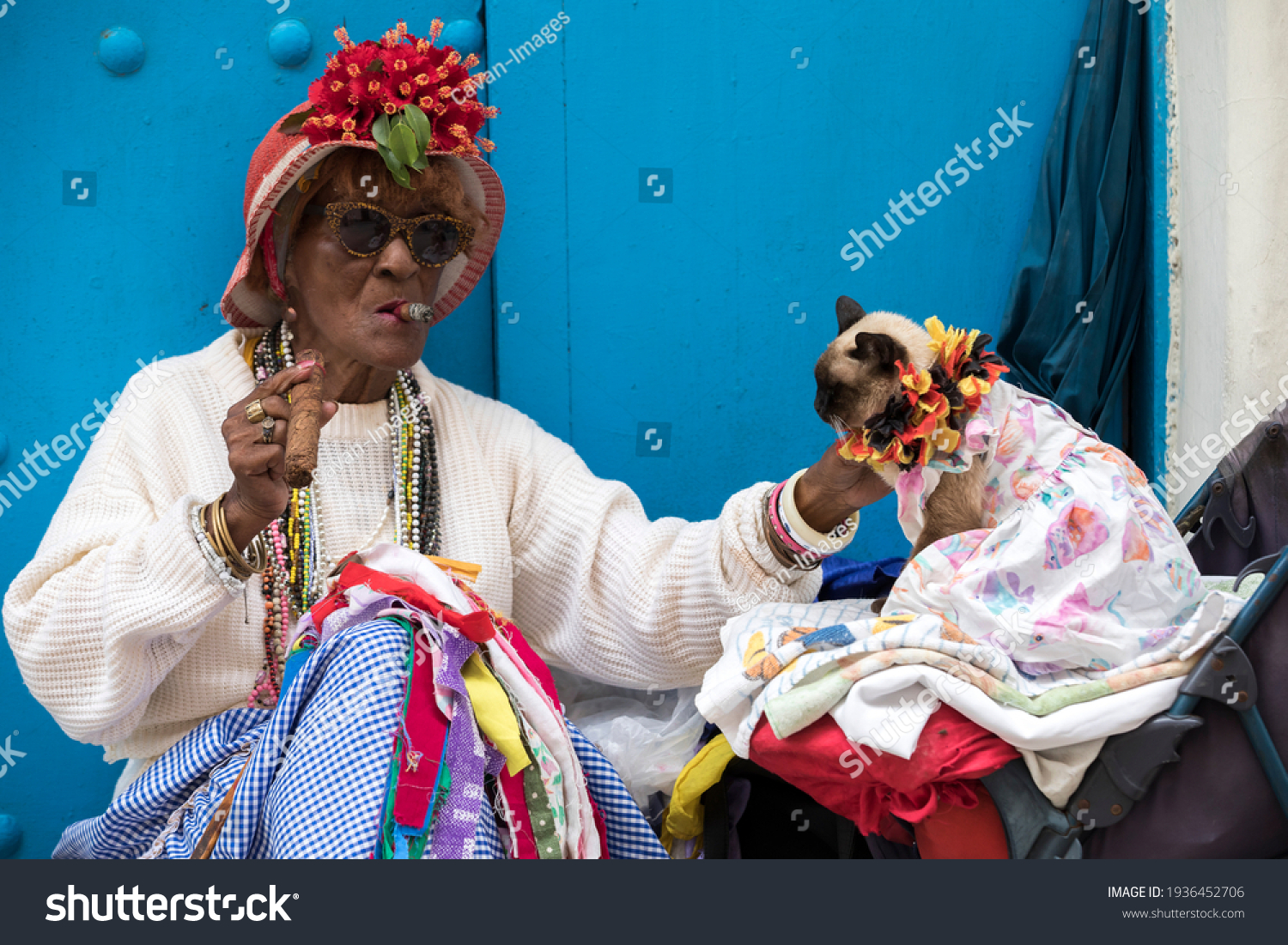 6 757 Black Woman Smoking Cigar Stock Photos Images Photography   Stock Photo Havana Cuba March An Older Cuban Woman Smokes Two Cigars And Pets A Cat 1936452706 