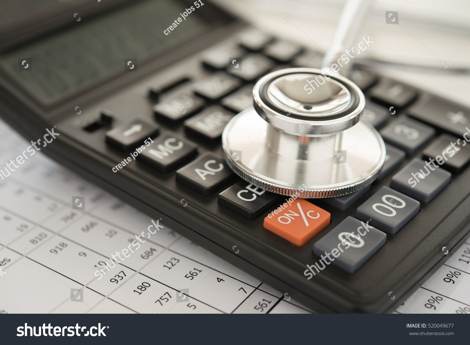 Stethoscope And Calculator Stock Photo - Image: 52143042