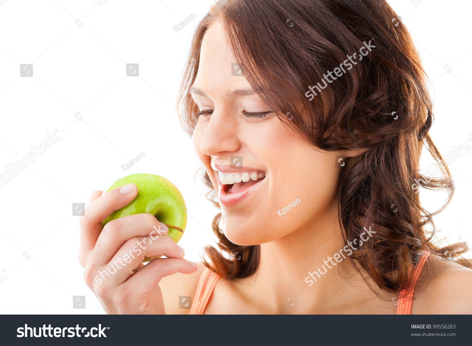 Healthy Nutrition And Healthy Teeth Or Diet, Young Woman Bites In A ...