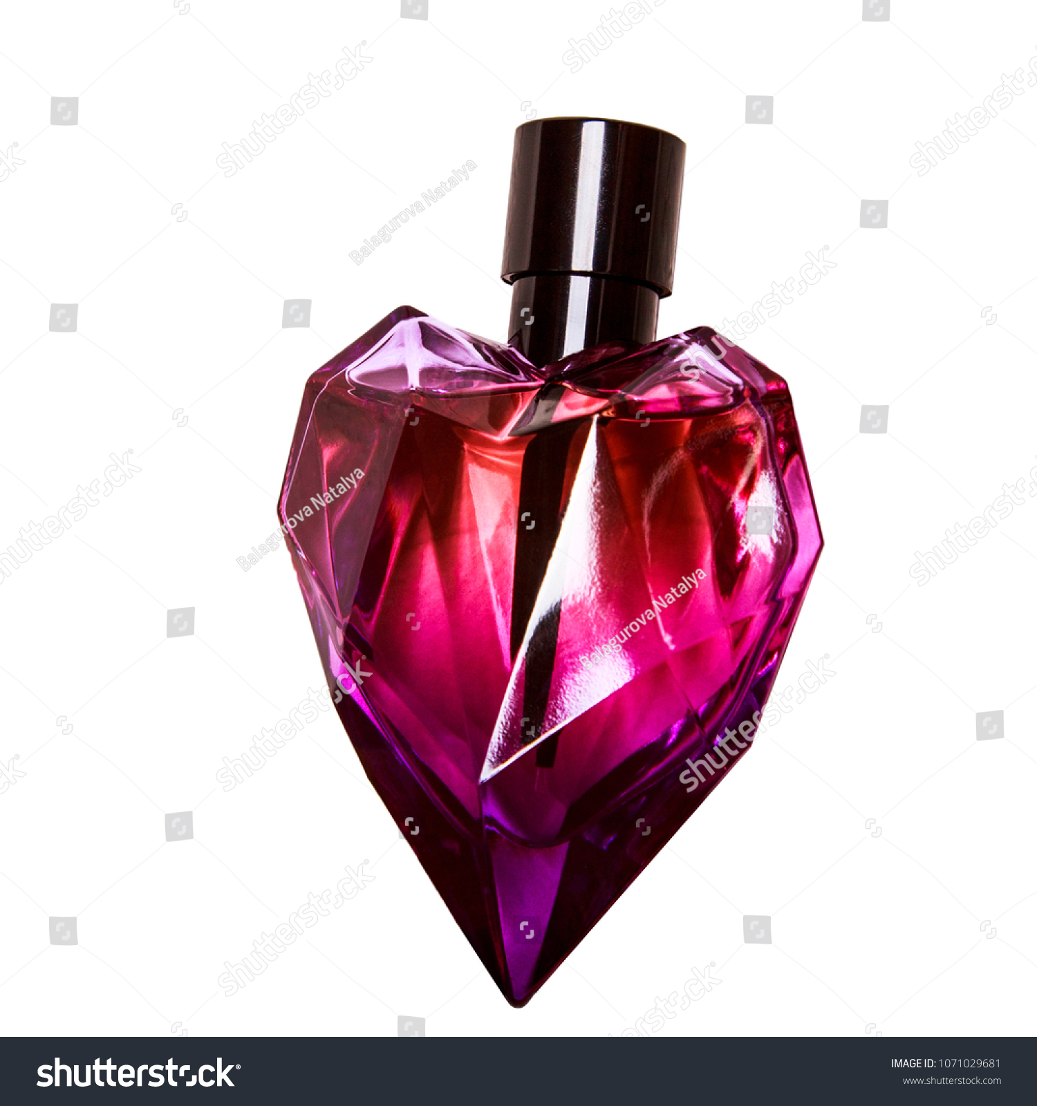 Heartshaped Perfume Bottle Isolated On 