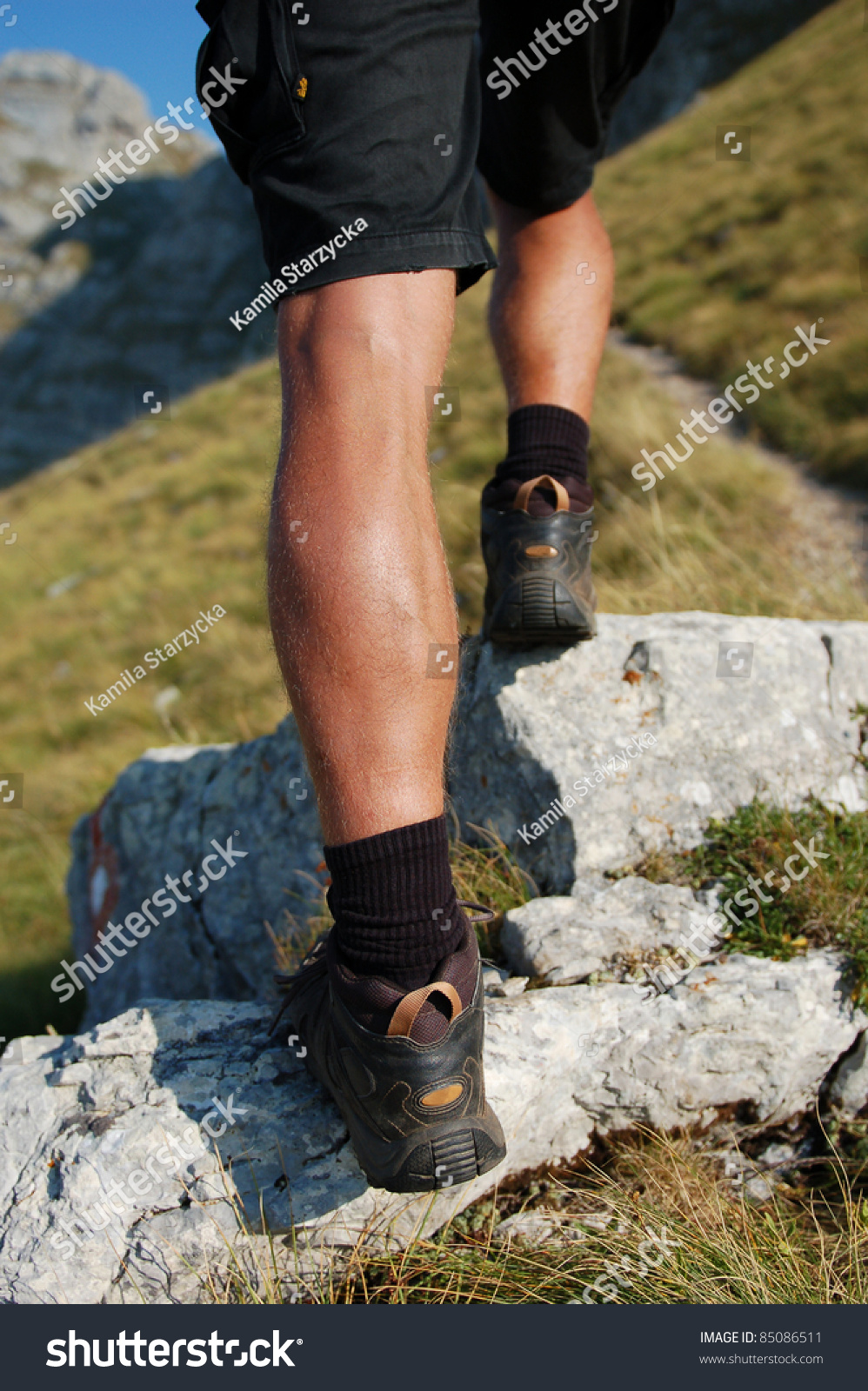 Hiker/Legs And Boots Of Hiker Stepping Through The Rock Stock Photo ...