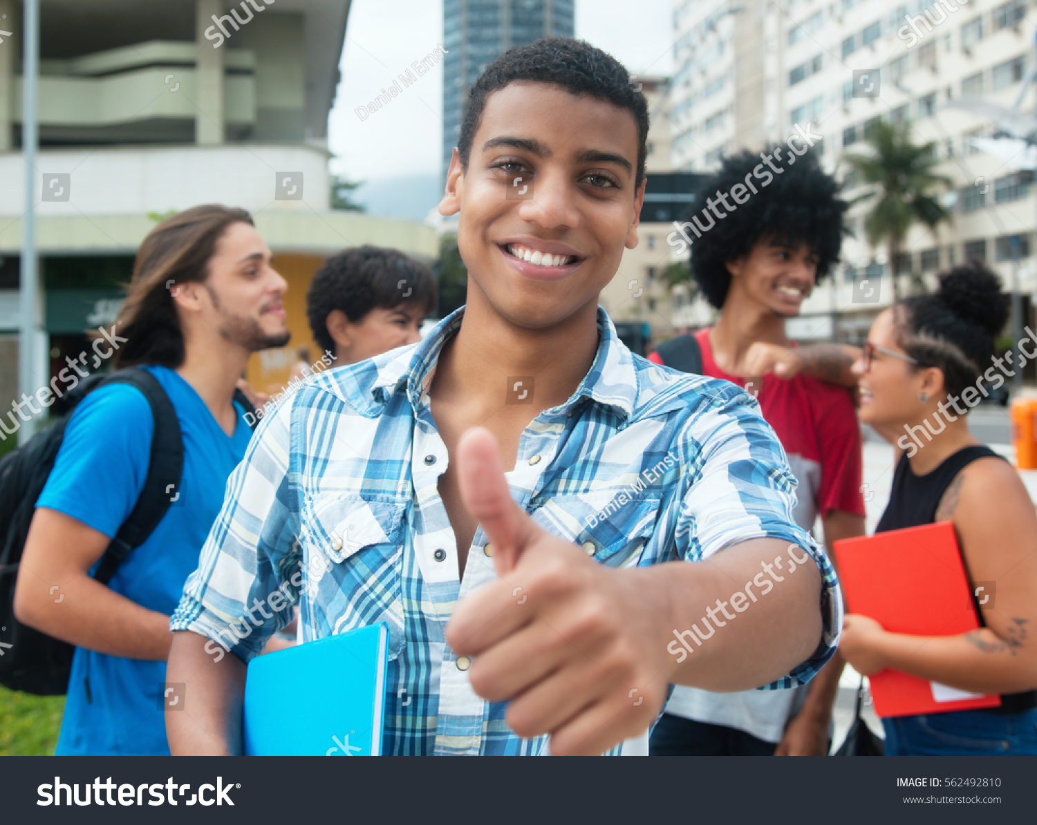 Hipster Male Student Showing Thumb Group Stock Photo | hipster male student showing thumb group stock photo Hipster Male Student Showing Thumb Group Stock Photo | hipster male student showing thumb group stock photo