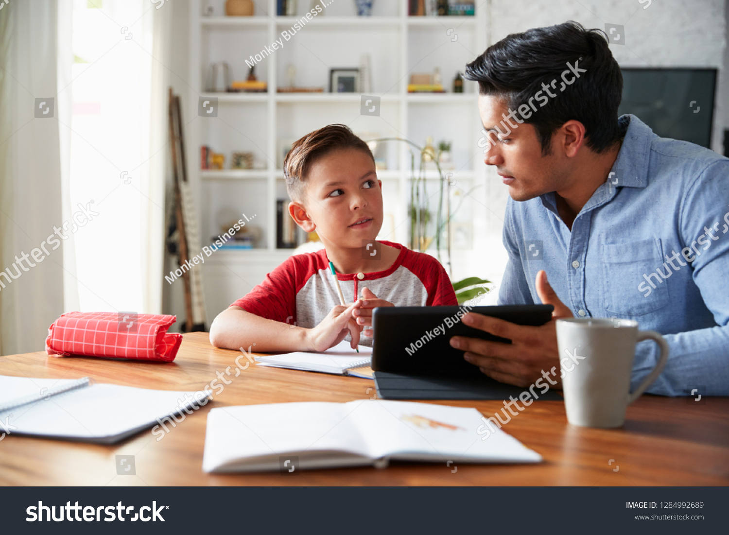 Hispanic Preteen Boy Sitting Dining Room Stock Photo (Edit Now) 1284992689