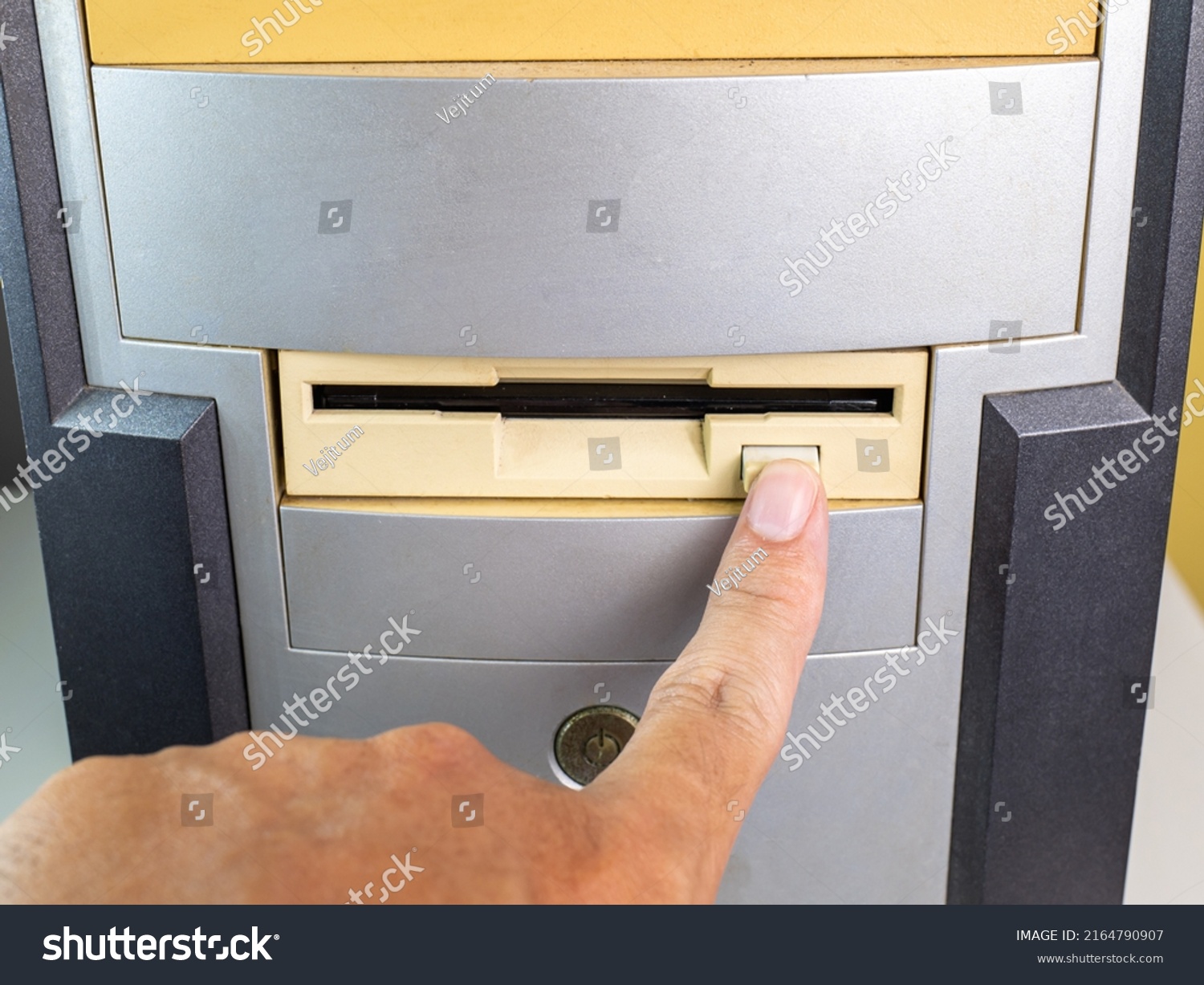 Stock Photo Hold The Floppy A Disc And Insert The Reader To Read And Write Data It S Technology Old That Have 2164790907 