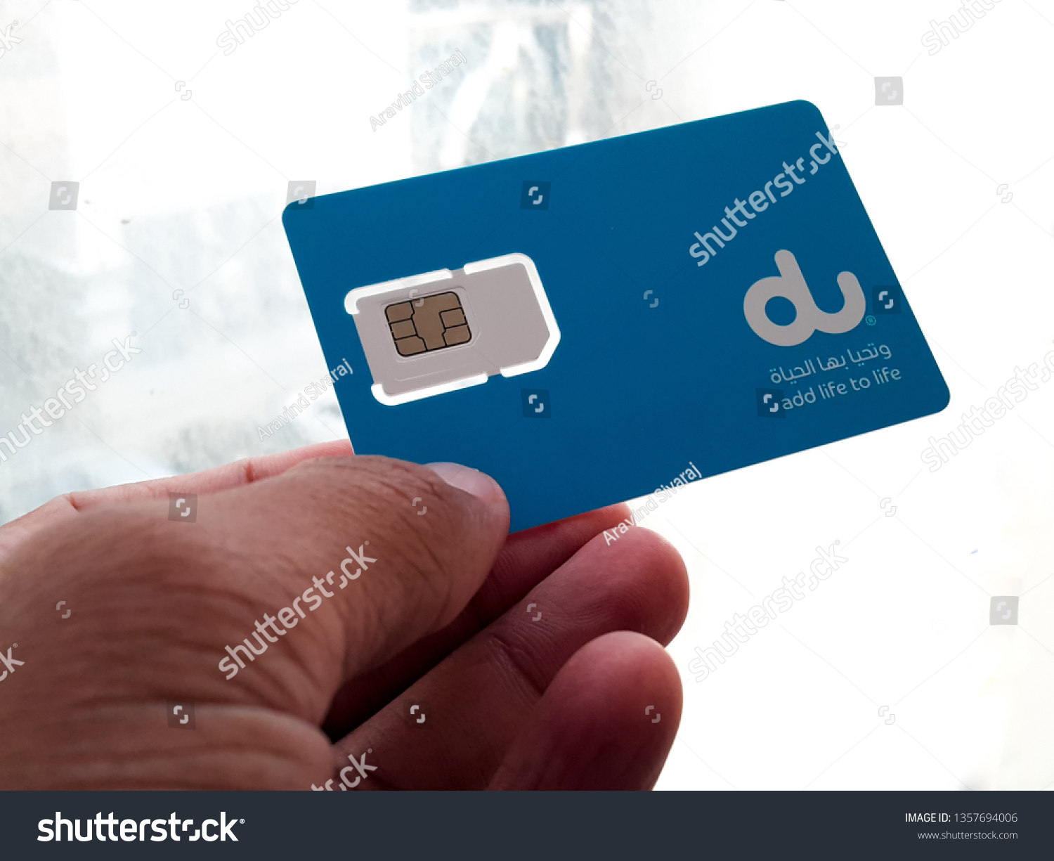 Holding Du Sim Card Abu Dhabi Stock Photo Edit Now 1357694006