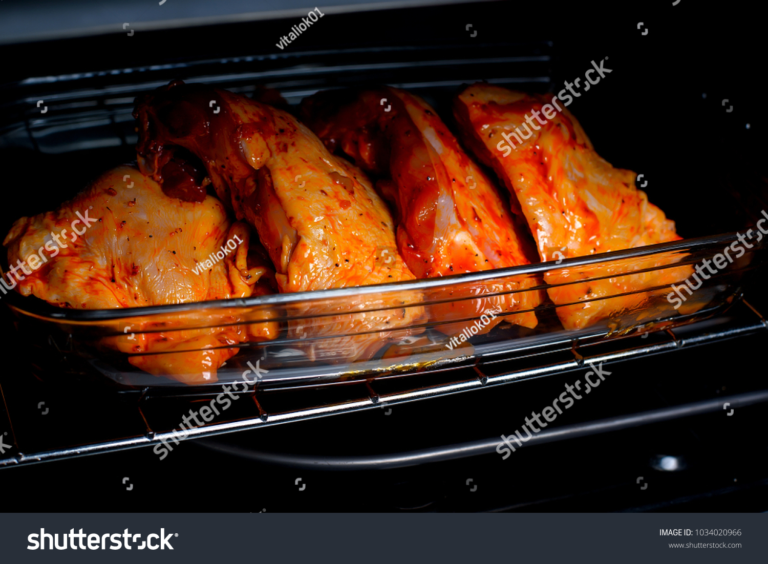 home-cooking-chicken-oven-stock-photo-1034020966-shutterstock