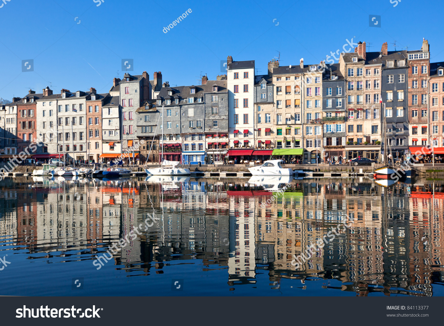 Honfleur Harbour In Normandy, France. Color Houses And Their Reflection ...